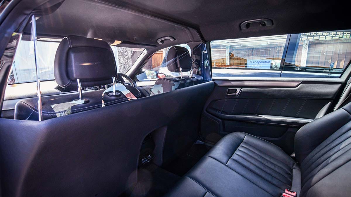 A screen in one of the funeral limousines