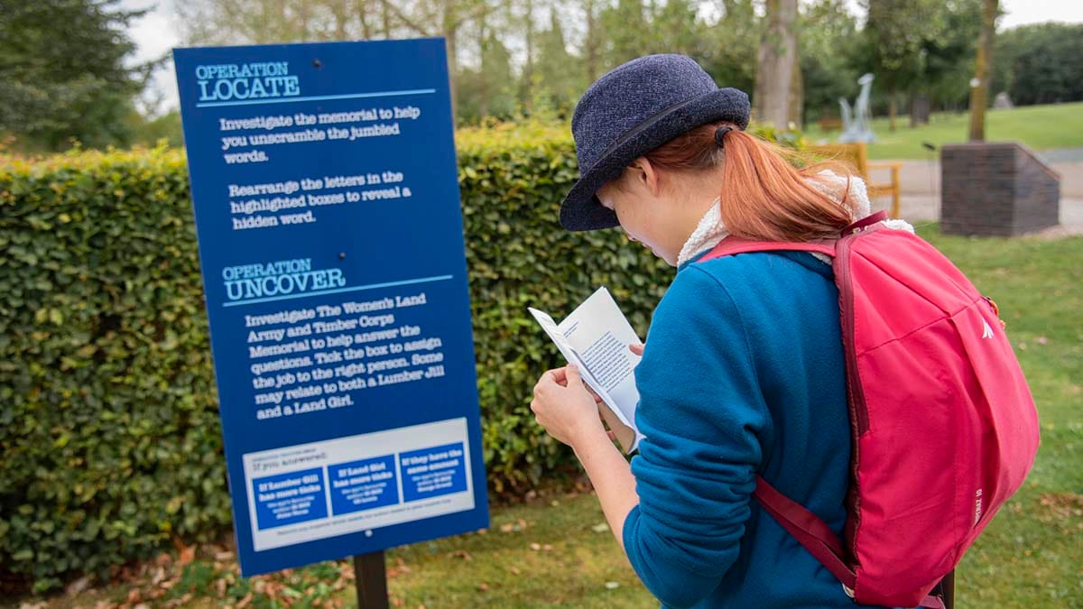 A visitor taking on the new escape challenge at the National Memorial Arboretum