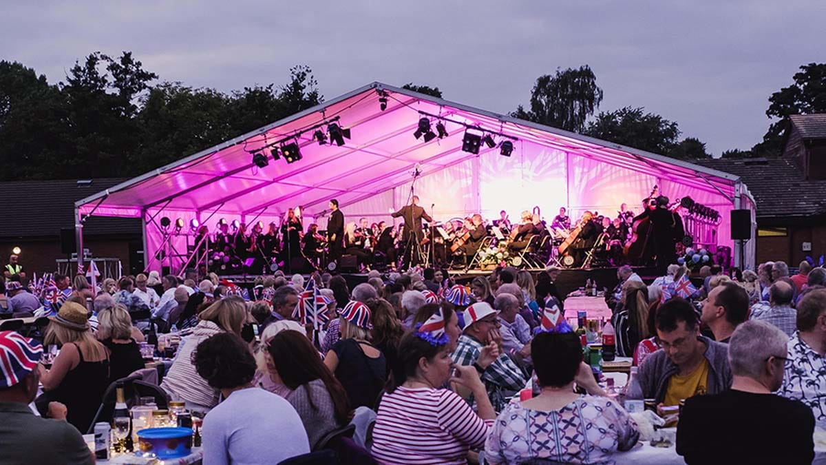 The British Police Symphony Orchestra performing at the Lichfield Proms in Beacon Park