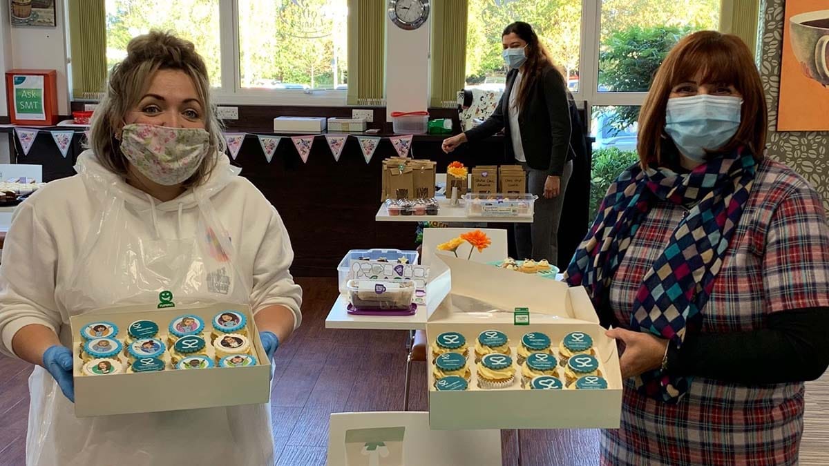 Jo-Ann Beech and Carrie Pawlowski at the cake sale