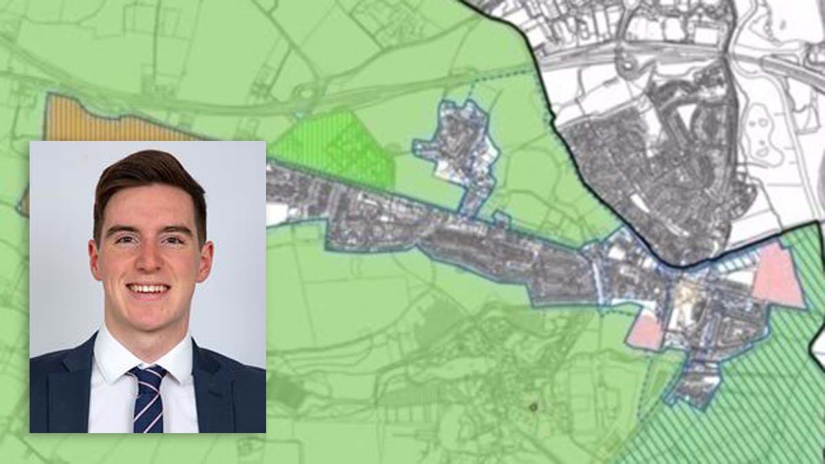Cllr James Parton-Hughes with the map outlining the allocations planned for the Mile Oak and Fazeley area