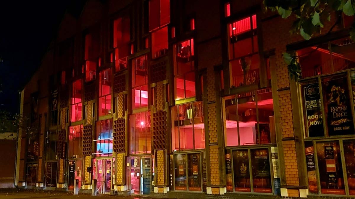 The Lichfield Garrick lit up red as part of a national day of action