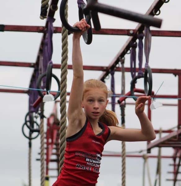 Libbie Joyce competing in an obstacle race