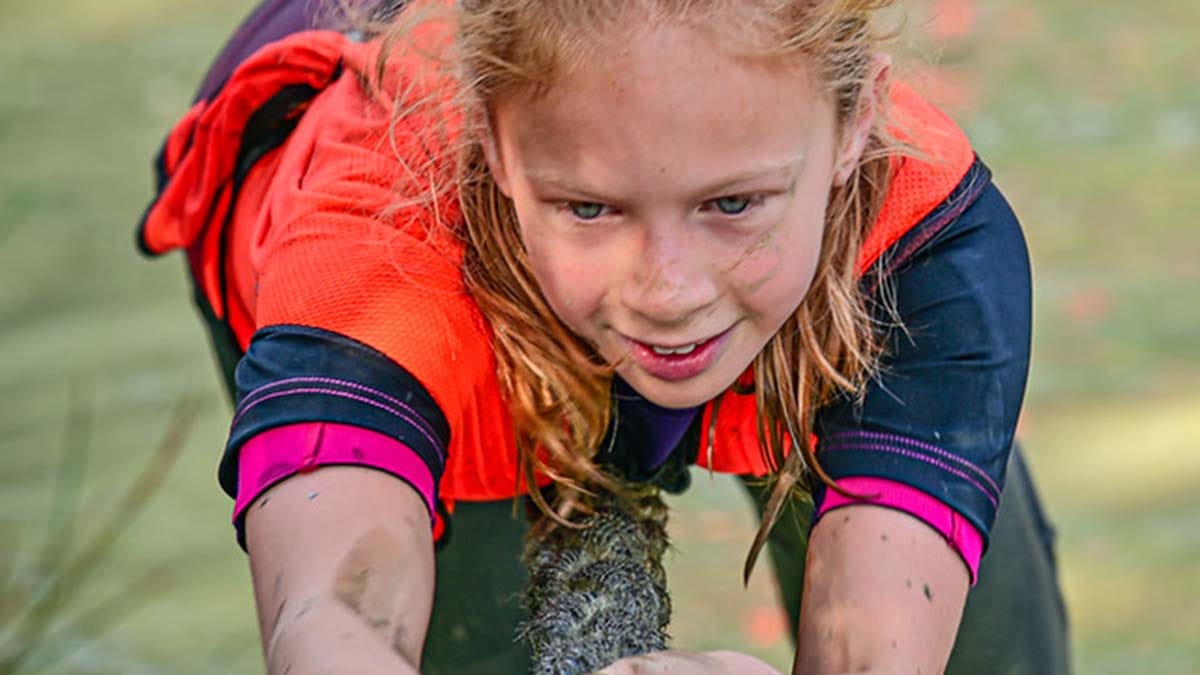 Libbie Joyce competing in an obstacle race