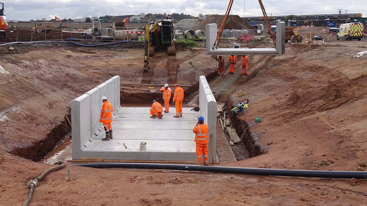 Concrete sections of the culverts are put in place to allow bridges to be built over the Lichfield Canal