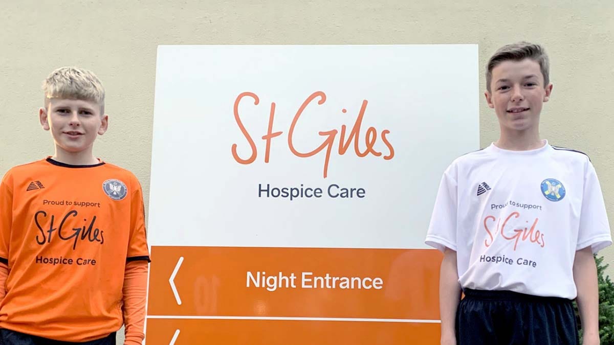 Harry Crooks and Lucas Thompson in their new St Giles Hospice branded kits