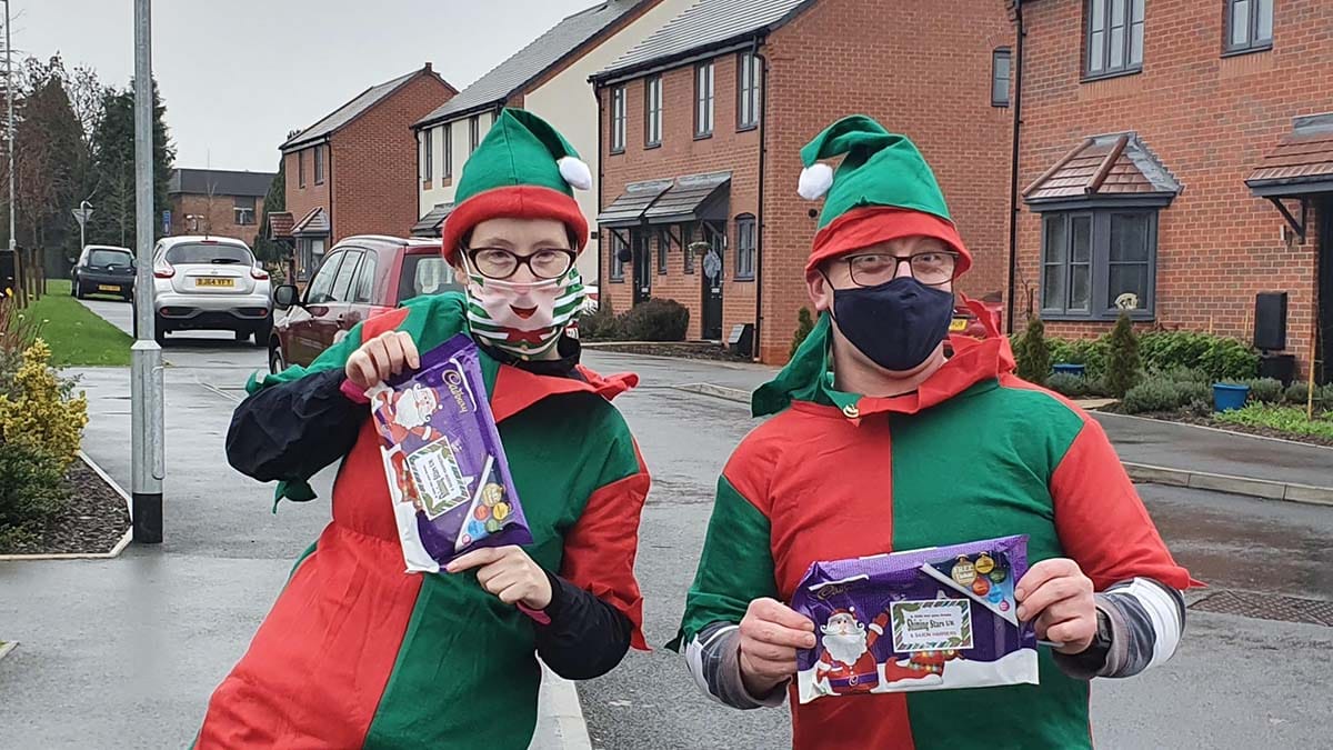 The Saxon Harriers members delivering selections boxes in Lichfield