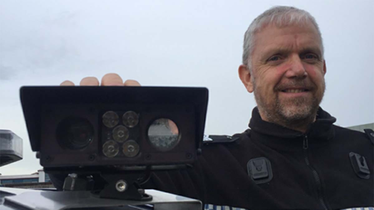 An officer with one of the ANPR cameras