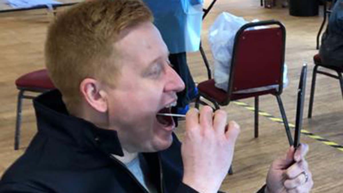 Cllr Doug Pullen taking his lateral flow test in Lichfield