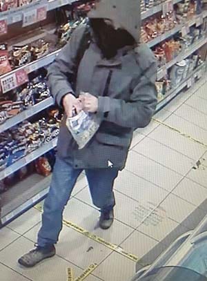 CCTV of the man wanted in connection with the petrol station robbery in Lichfield