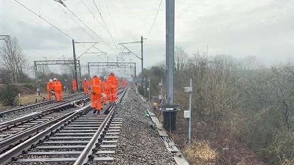 Engineers at the site of the landslip