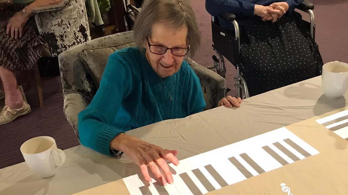 A resident trying out the Magic Table 360