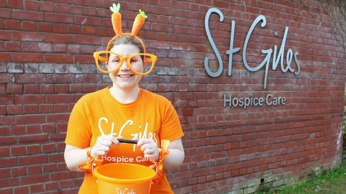 St Giles Hospice healthcare assistant Amy Foster getting ready for Orange April