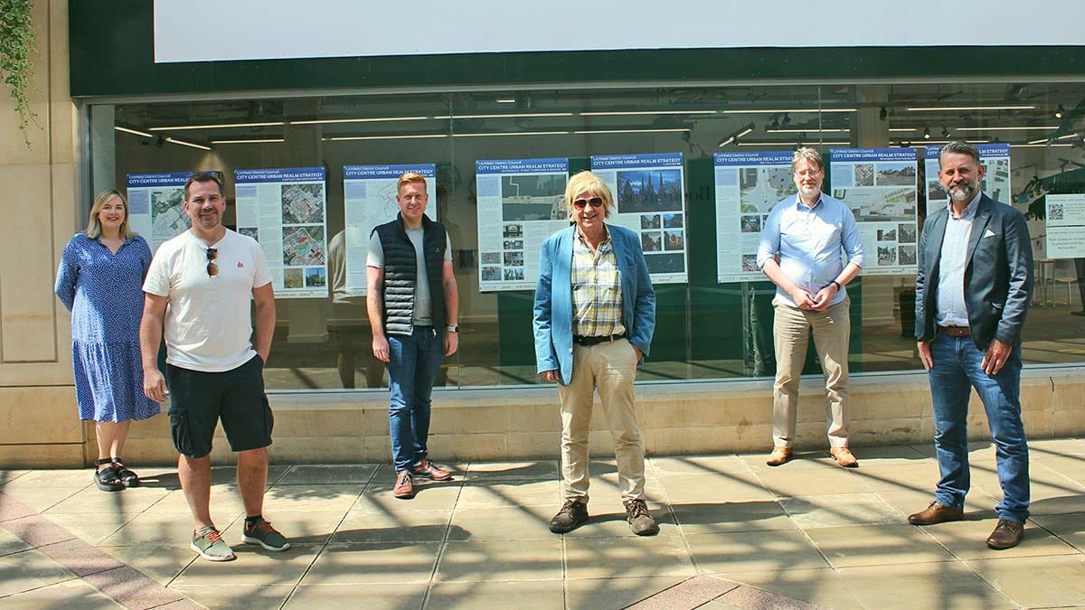 Michael Fabricant joins council representatives outside the exhibition of plans for the future of the city centre