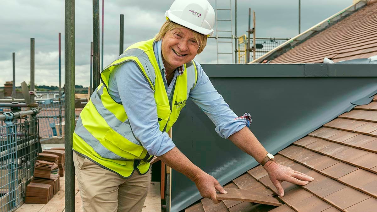Michael Fabricant MP laying the final tile