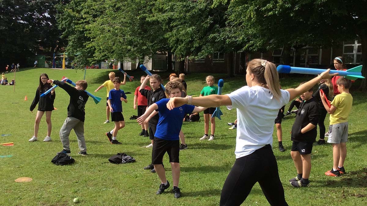 Katie Stainton teaching javelin skills