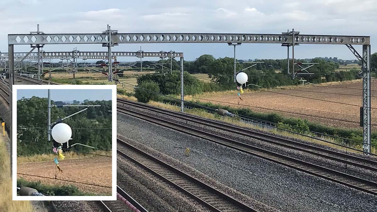 The balloon caught in overhead cables on the West Coast Main Line