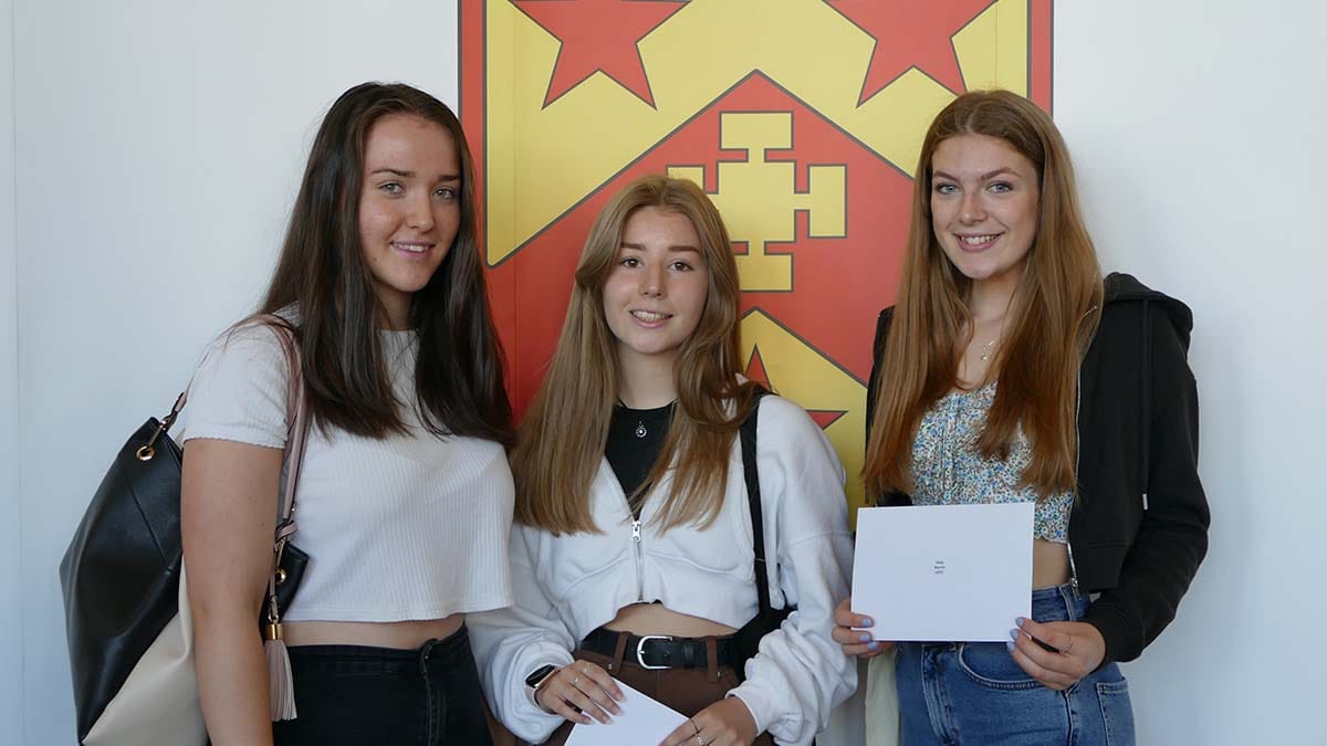 Sophie Forbes, Ellie Sanders and Lowri Simmons collecting their GCSE results