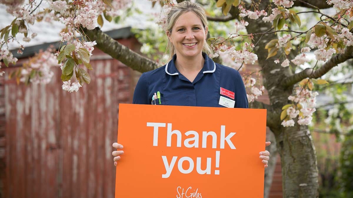 Ward sister Ruth Abell thanking players for taking part in the raffle