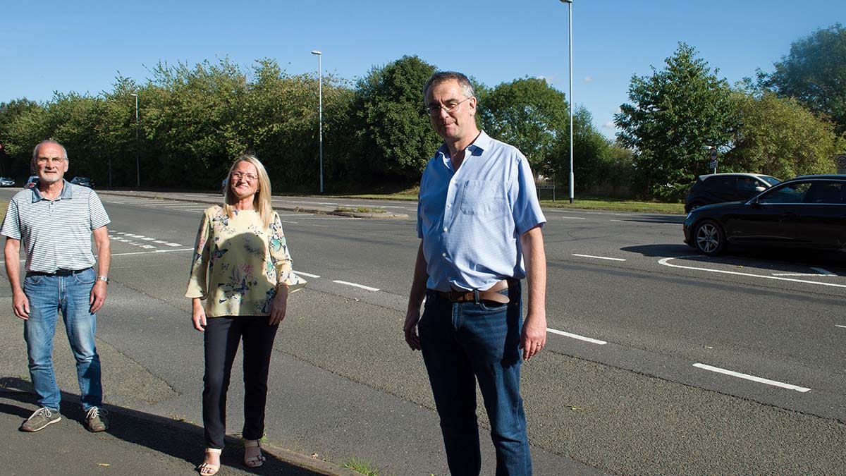 Residents Robin Horton and Elaine Hutchings who have been campaigning for safety improvements at the junction alongside Cllr Paul Ray