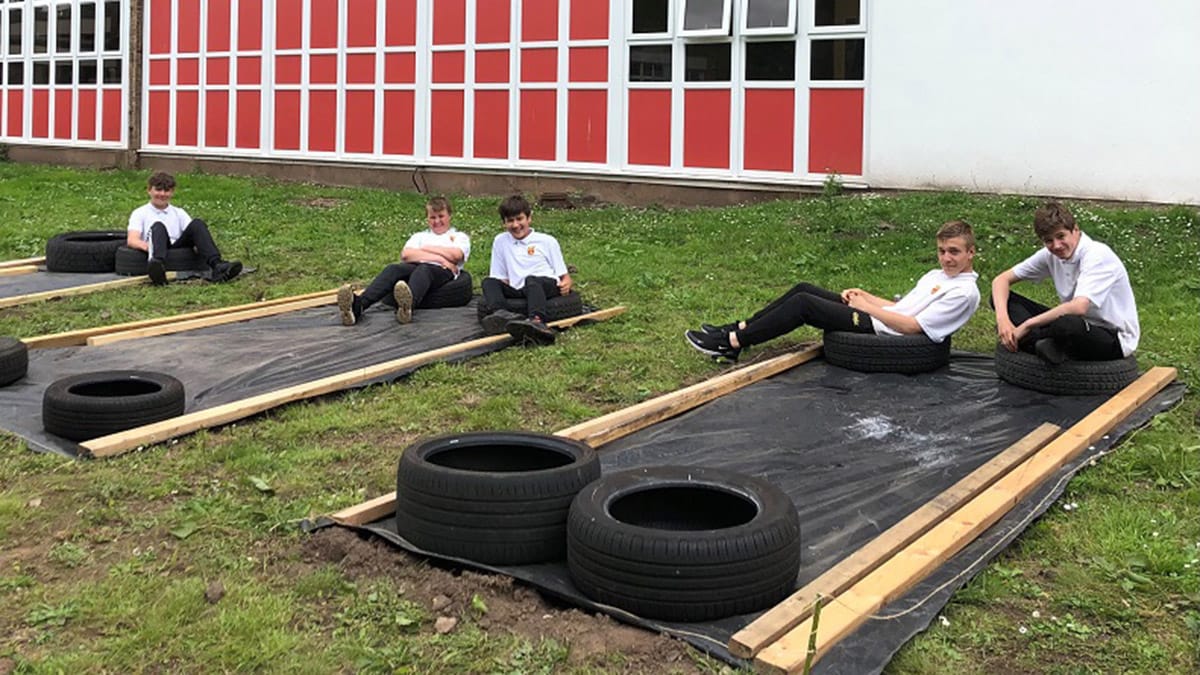 Pupils working on the allotments area at Nether Stowe School