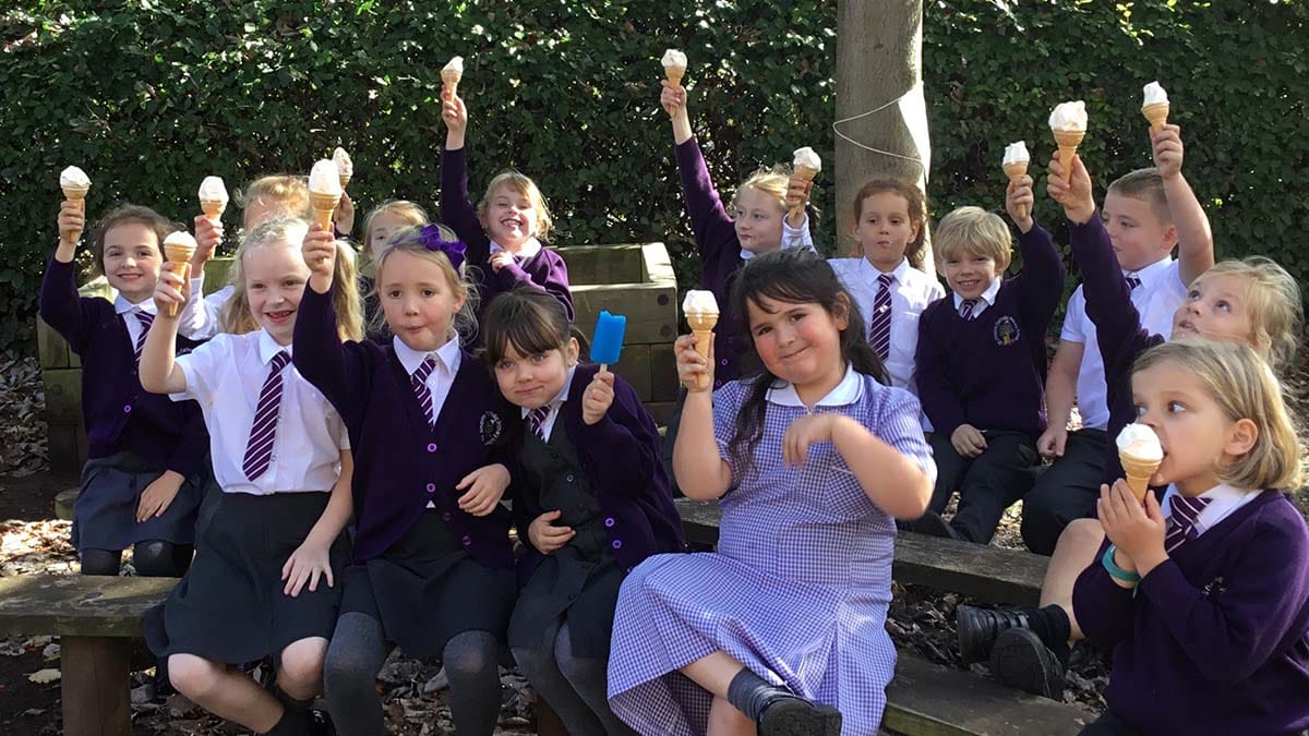 Year 2 pupils enjoying their celebratory ice creams