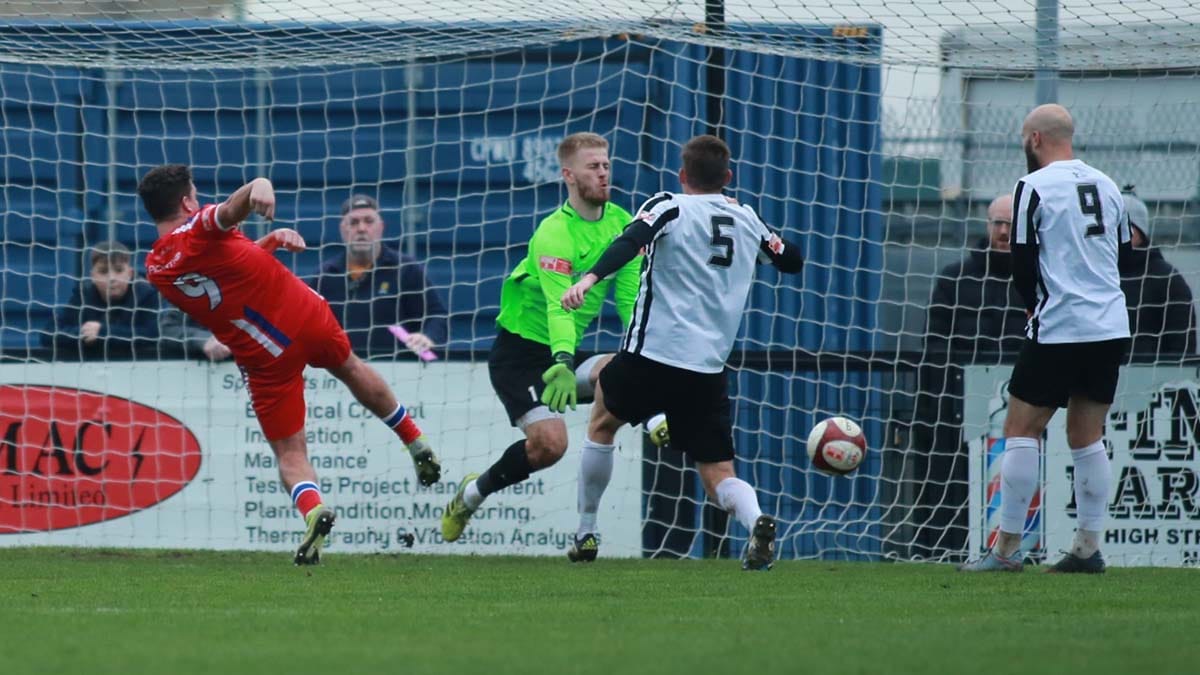 Joey Butlin restores Chasetown's lead against Corby Town. Picture: Dave Birt