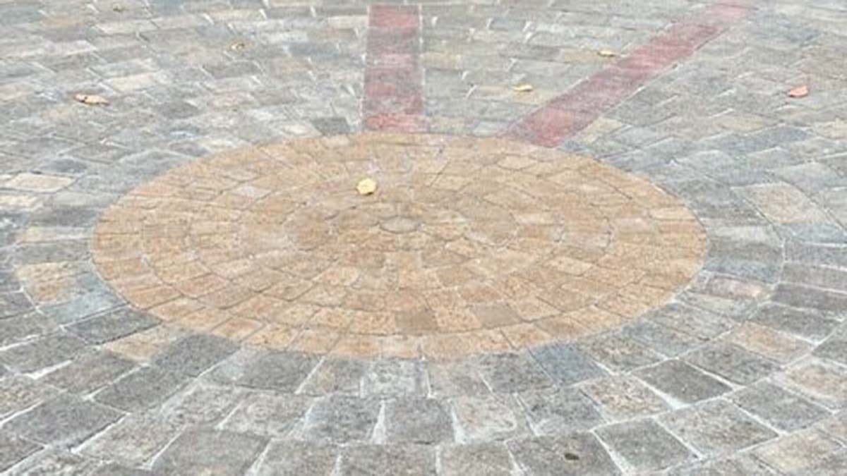 The new block paved clock face at the war memorial