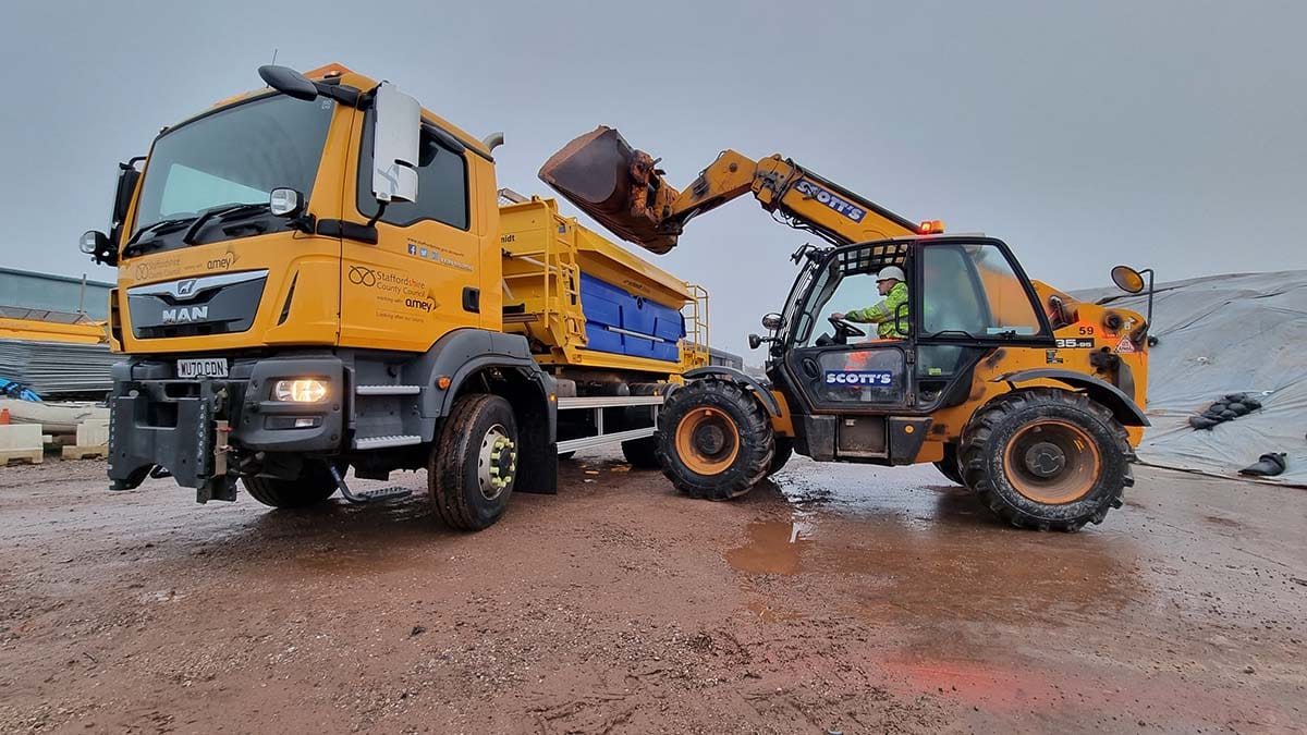 A gritter being loaded