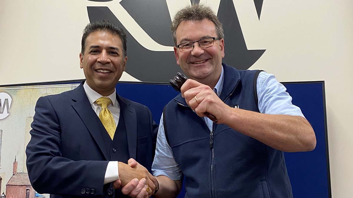 Raj Athwal with auctioneer Richard Winterton