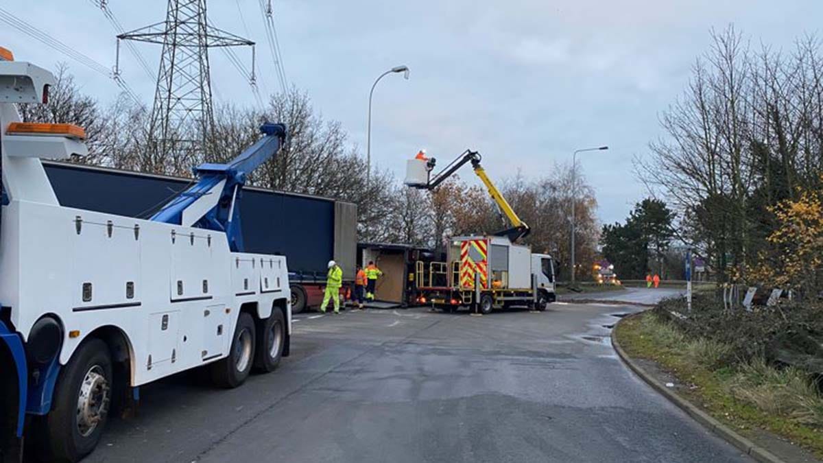 Recovery teams on site after the lorry overturned. Picture: National Highways
