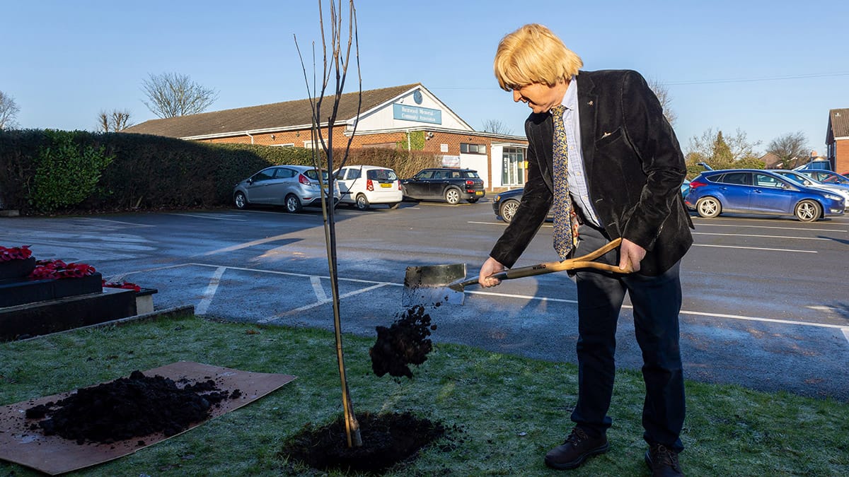 Michael Fabricant planting the tree at Burntwood Memorial Institute