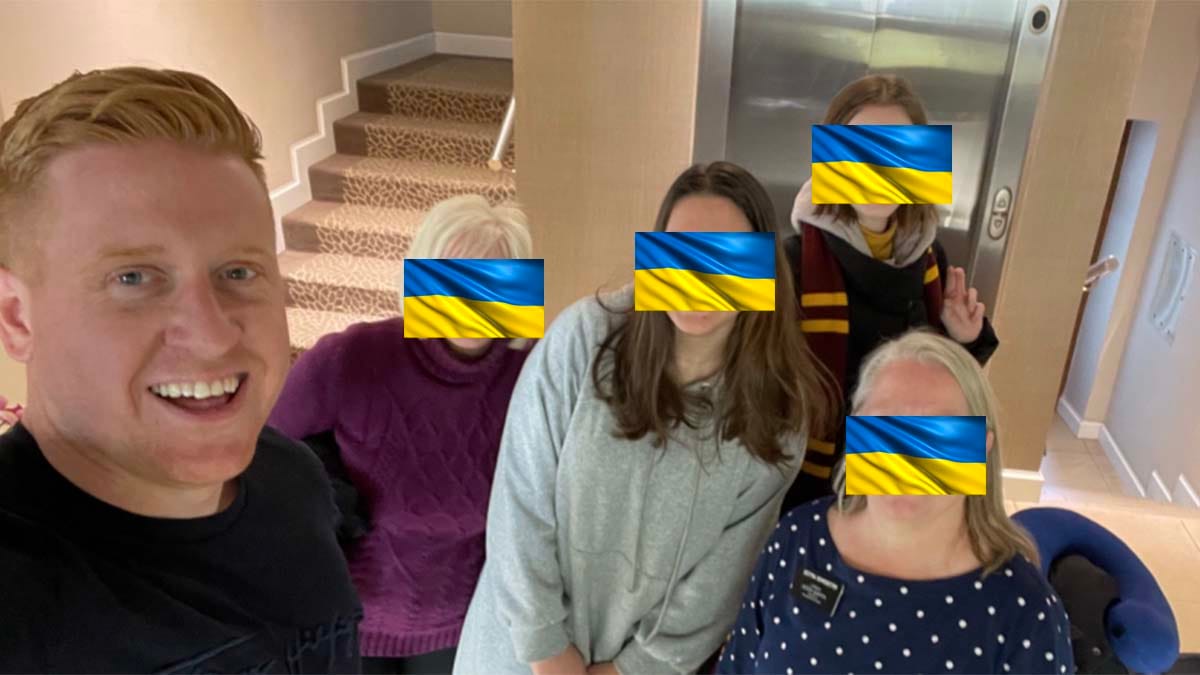 Cllr Doug Pullen with some of the Ukrainians he helped travel across Poland (faces blurred to protect identities)