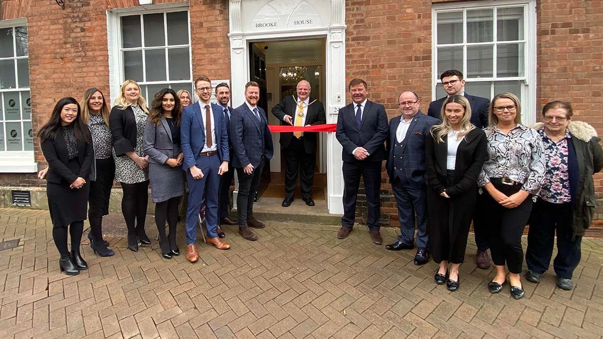 The Mayor of Lichfield preparing to cut the ribbon at Brooke House