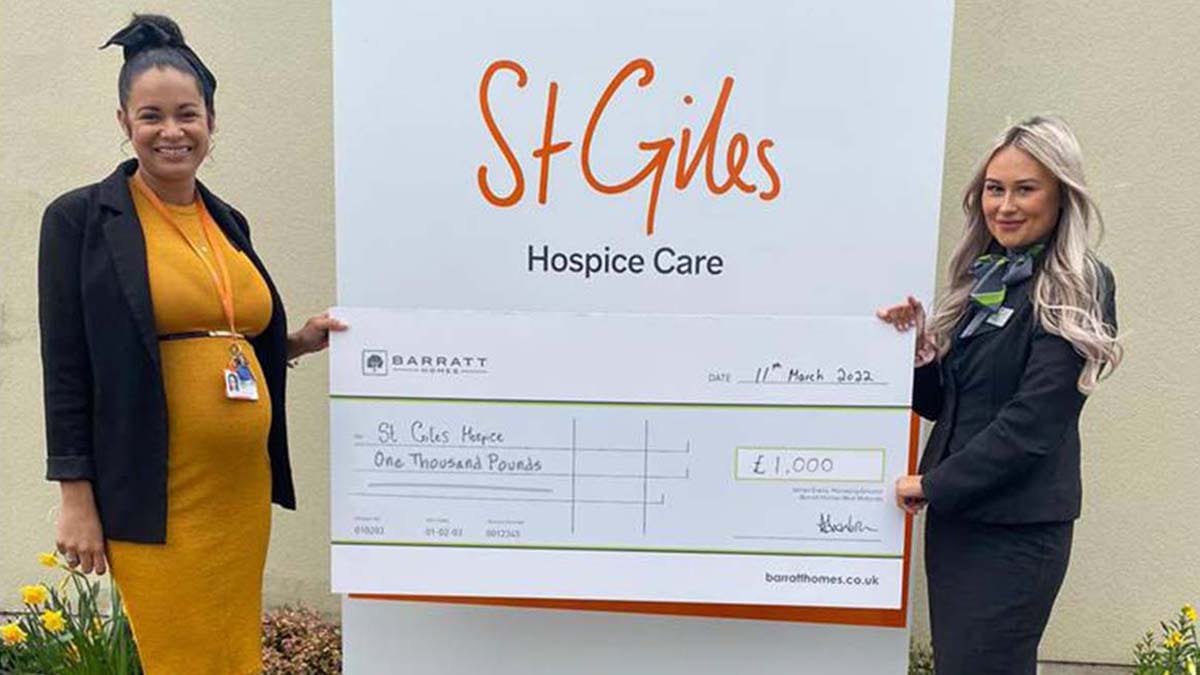 The donation being handed over to St Giles Hospice