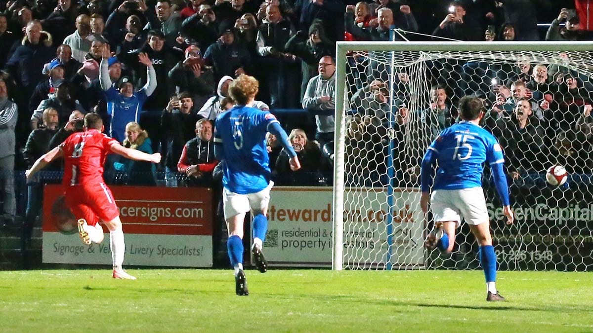 Jack Langston scores the winning penalty against Halesowen Town. Picture: Dave Birt