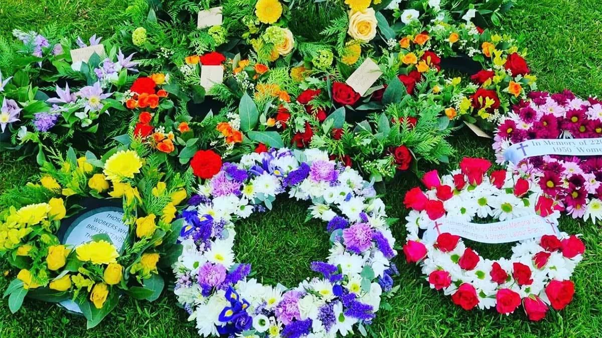 Some of the wreaths laid to mark International Workers Day