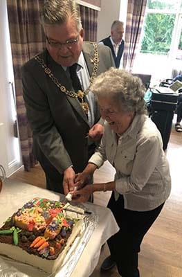 The birthday cake being cut at The Spires