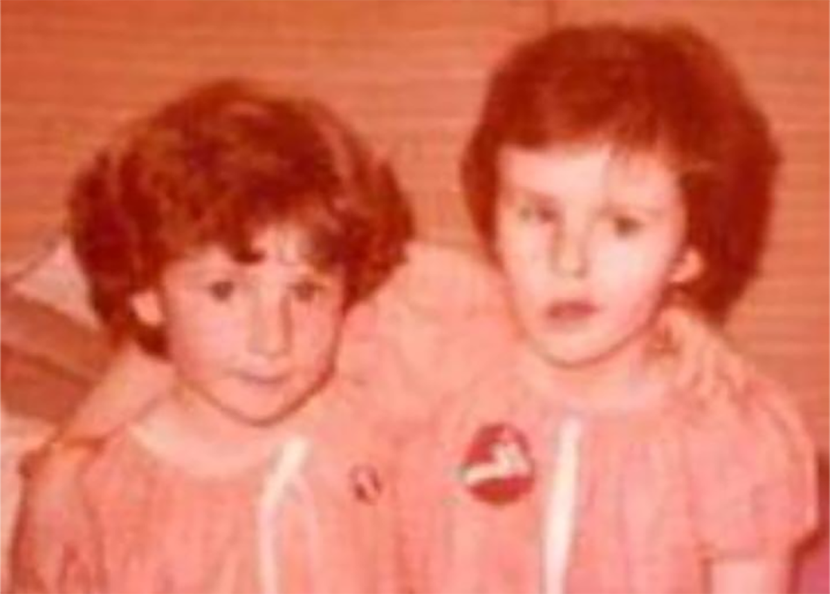 Sarah, left, with her sister Katie in 1977