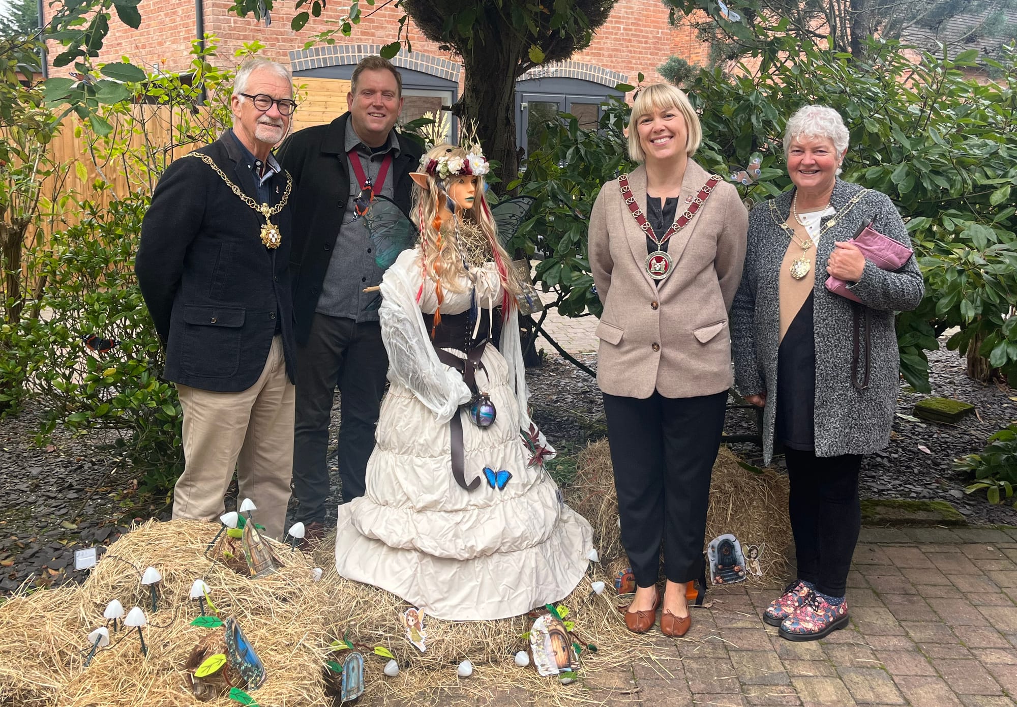 Judging at the Heart of the Country Shopping Village scarecrow festival