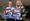 Charlotte Mills and Lorraine Ward holding podcast posters