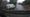 A van and trailer caught on a dashcam using the pavement to overtake a roadworks team