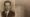 The photograph and the handwritten note on the back