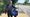 Cllr David Williams stood next to a cycle path