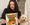 Sam Fletcher-Goodwin with the book and her dog Willow