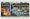 The Pokemon Base Set booster pack art set, with three sealed packs featuring the Charizard, Blastoise and Venusaur designs