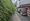 A HGV passing the blocked footpath near a children's play area in Streethay