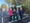 Sarah Edwards and Lillian Greenwood with local representatives looking at new electric vehicle charging points