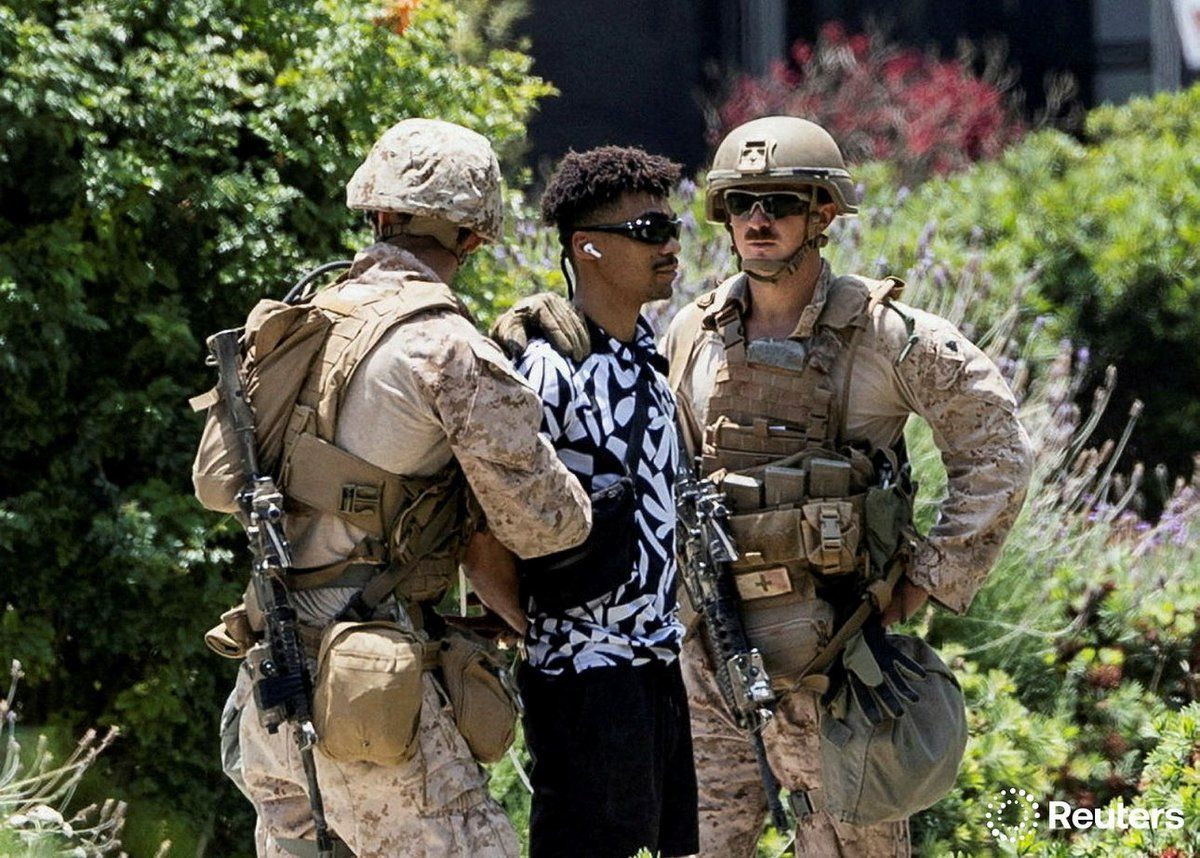 BREAKING: MARINES DETAIN PROTESTOR