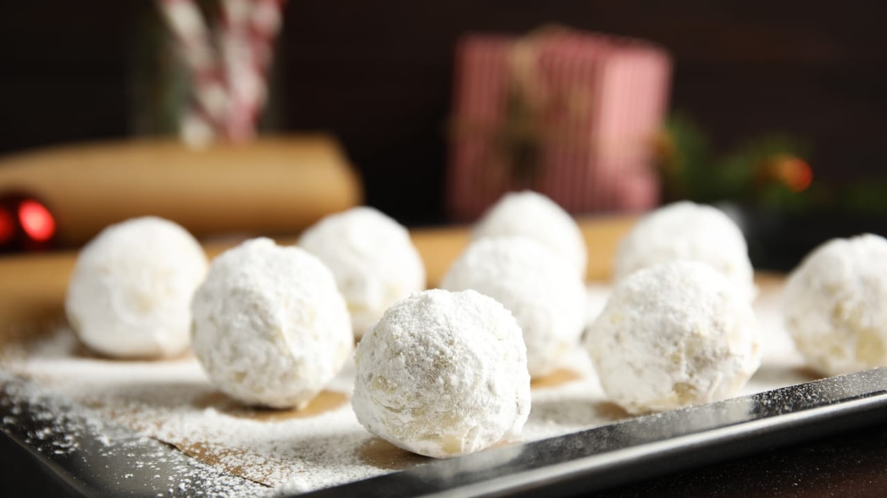 A pan of freshly baked Greek Christmas cookies.